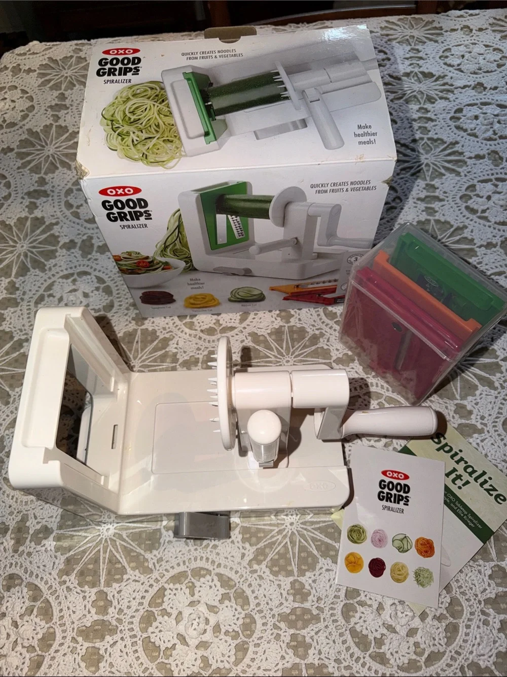 OXO Good Grips Spiralizer in White with Gray Clamp and Colorful Blades & Holders